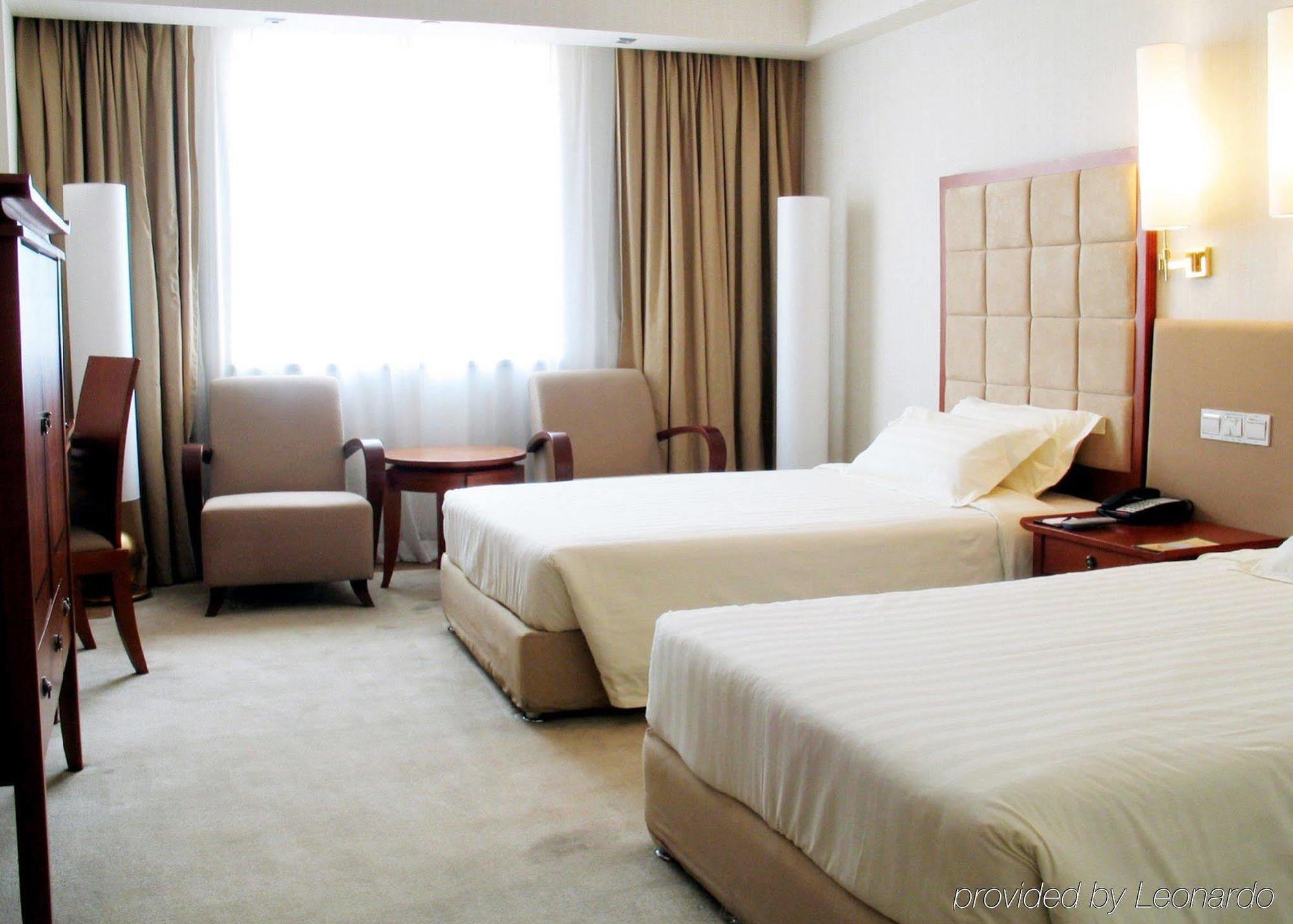 Chang An Grand Hotel Peking Pokoj fotografie